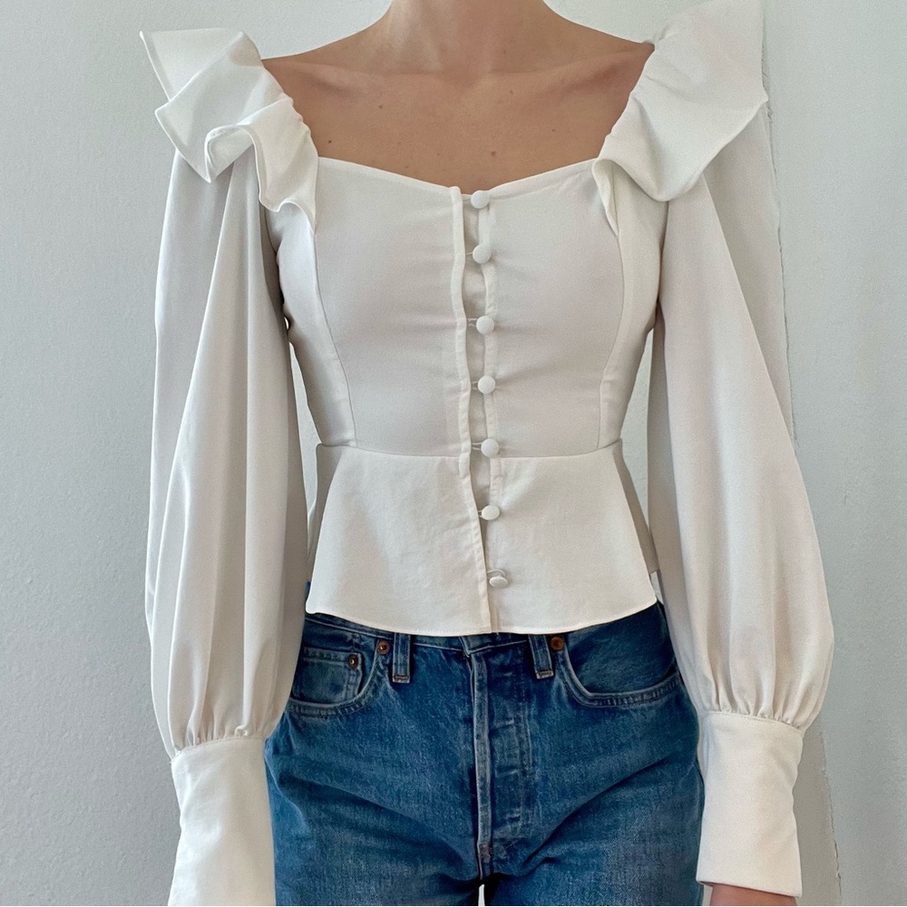 Ruffle Shoulder Peplum Top